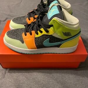 Nike Kids Sneakers in Black, Orange, and Teal